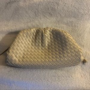 Cream woven clutch